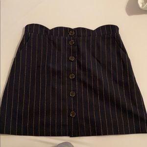 Black pin stripe skirt.